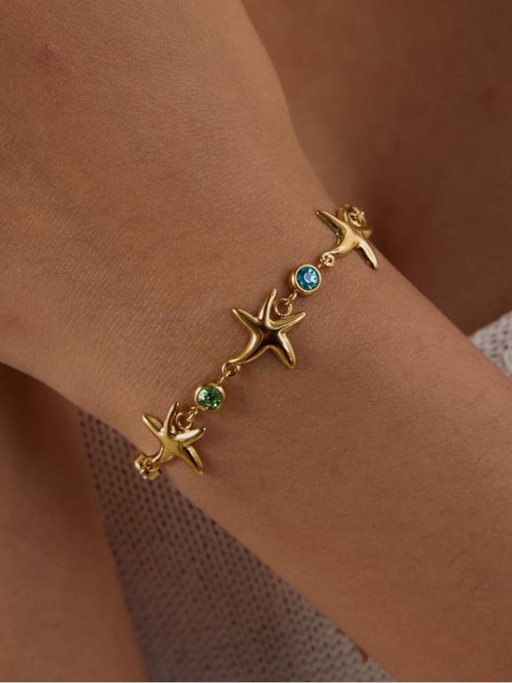 Anthropologie Gold Starfish Bracelet with Blue and Green Accents
